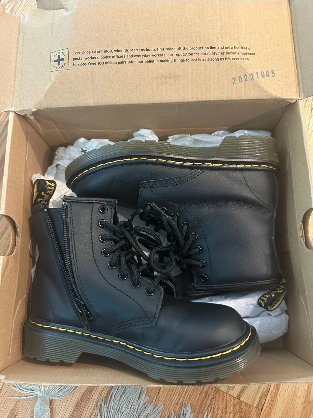 Kids Dr. Martens Black Leather 8-Eye Lace-Up Boots with Yellow Stitching